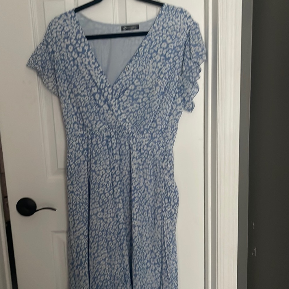 Pretty garden floral wrap dress. Beautiful blue color with wrap style